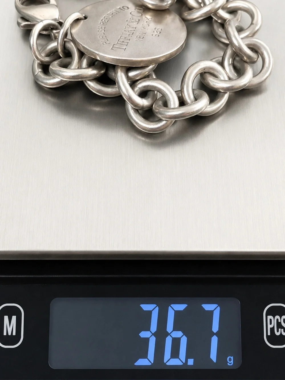 Authenticated Tiffany & Co. Return to Tiffany Round Charm Bracelet Silver 7.5”